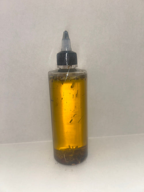 8oz bottle of Hair Krack Hair Oil