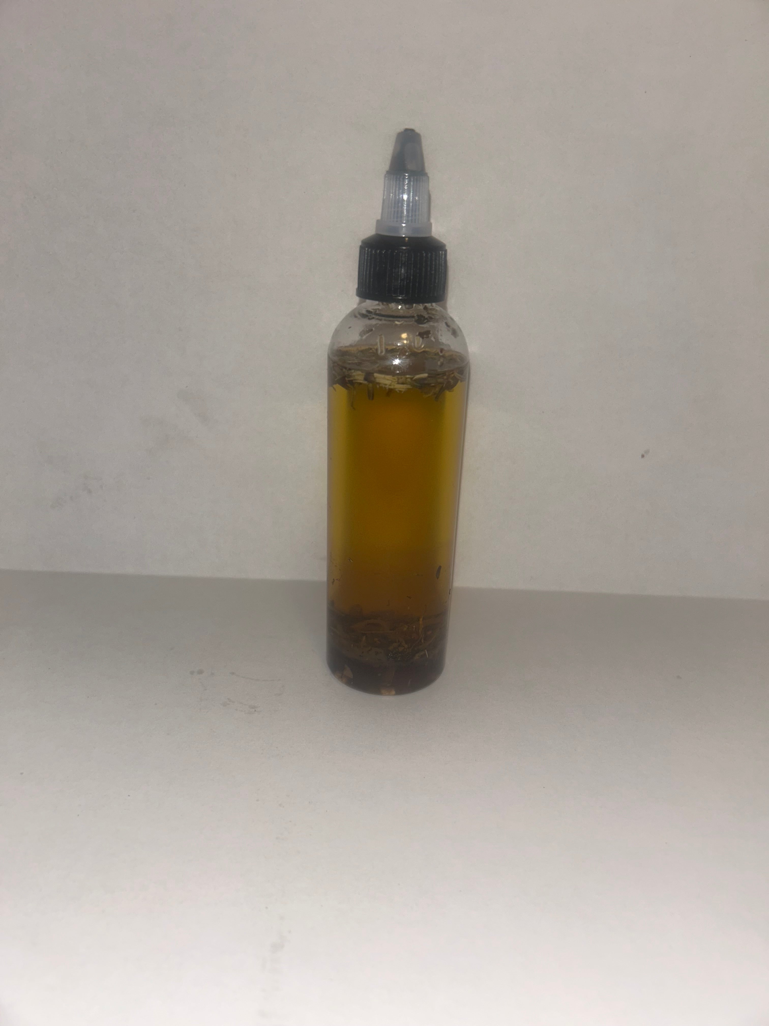 4oz bottle of Hair Krack Hair Oil