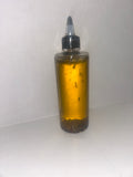 8oz bottle of Hair Krack Hair Oil